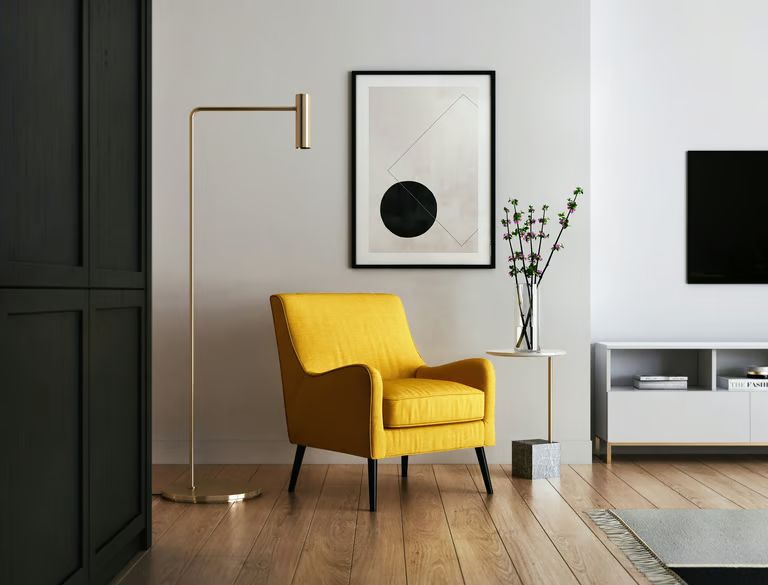 A Labrador dog chewing n a bone.